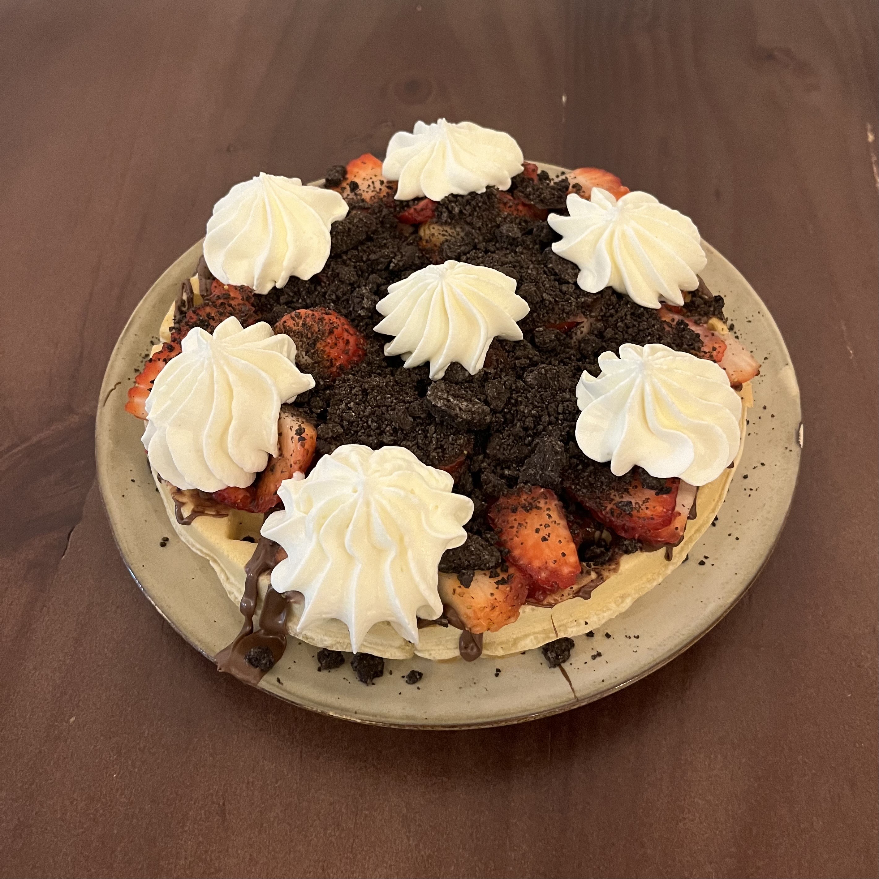 Waffle con chocolate belga y frutillas